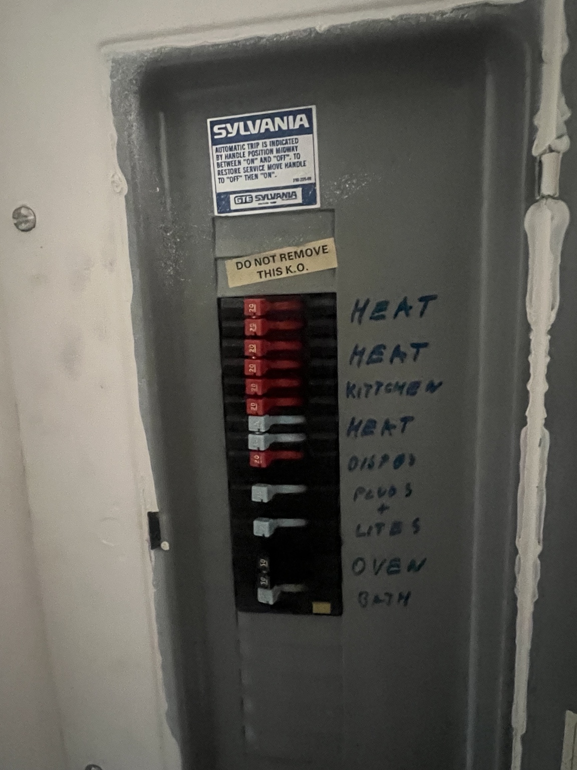 GTE Sylvania panel with visible breakers and handwritten circuit directory